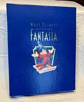 Front of blue slipcase with Sorcerer Mickey graphic