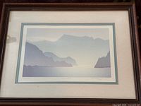 Framed serigraph showing full artwork with mat and frame