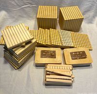 Overall view showing thousand cubes, hundred flats, ten rods, unit cubes in trays