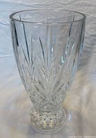 Full view of vase showing shape, cut pattern, pedestal base