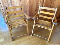 Front view showing both wooden folding children's chairs upright