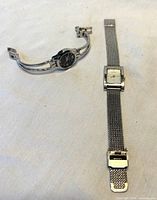 Overall view of both watches laid flat