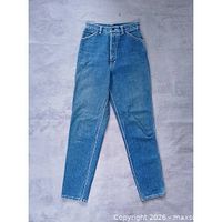Full front view of blue denim jeans