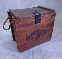 Front view showing branding, latch, and rope handle