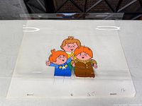 Cel over drawing showing three cartoon children, full sheet with peg holes