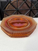 Stack of amber octagonal plates