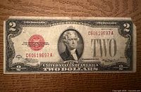 Full front view of 1928D $2 red seal note showing complete design