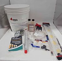Full lot showing bucket, booklet and all brewing accessories