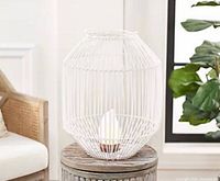 Lantern on table showing overall form and LED insert