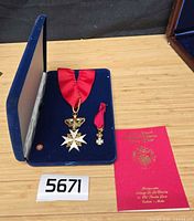 Medal set in blue velvet case with booklet