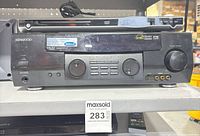 Front view showing Kenwood receiver and Daewoo DVD player stacked