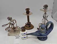 Group shot of all five lamps showcasing variety and condition