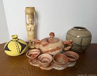 Full lot: stone tea set, two vases, wood figure