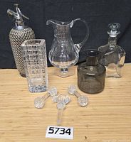 Group shot of all glassware items in lot