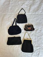 All five handbags arranged together