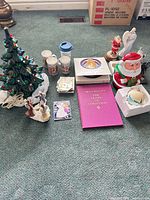 Overview of entire lot showing tree, mugs, figurines, ornaments, book, cookie jar
