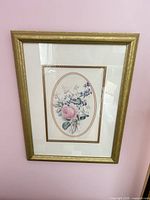 Full view of first framed print with rose illustration