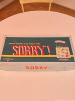 Closed box lid showing Parker Brothers Sorry! graphics