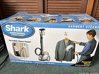 Retail box showing Shark Professional Garment Steamer details