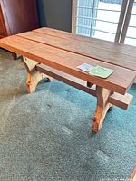 Angled view showing entire side table top, legs and stretcher