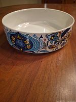 Top-side view of porcelain serving bowl showing interior and pattern