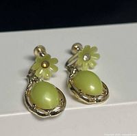 Front view of both dangle earrings showing lemon yellow cabochons in silver-tone settings and daisy accents with rhinestones