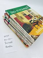 Stacked view showing spines of all six volumes