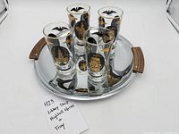 Full set of four glasses on tray