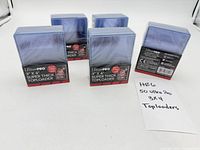 Five sealed packs of Ultra Pro 3" x 4" Super Thick Toploaders shown front view