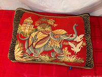 Front view showing tapestry design with elephant and birds