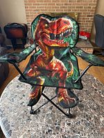 Front view of dinosaur folding chair