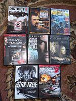 All eight DVD cases laid out for front cover visibility