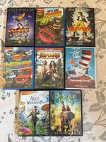 All eight DVD cases front covers visible in grid arrangement