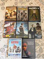 All eight DVD cases front covers visible