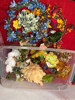 Overall lot view showing wreaths and tote with contents