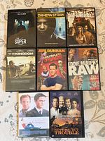 Eight DVD cases front covers visible