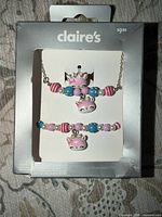 Front of sealed Claire's jewelry set package
