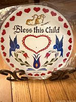 Front view showing full Pennsylvania Dutch design and sealed packaging