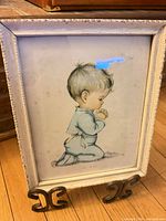 Framed print on stand showing full view