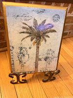 Front view showing vintage palm tree image on wooden plaque