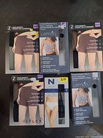 all six boxed undergarment packs laid out