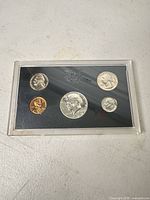 Front view of sealed 5-coin 1968 proof set
