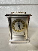 Front view showing Bulova dial, Roman numerals, silver-tone case