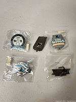 All five San Jose Sharks enamel lapel pins in bags