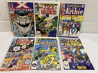 Front covers of all six comic books laid out