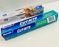 Front view of both wax paper boxes showing brands and 75 sq ft size