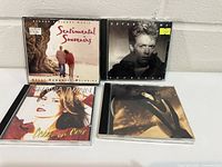 Front covers of all four CD jewel cases