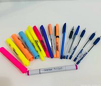 Entire assortment laid out on table showing all highlighters, pens and Copic marker