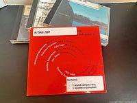 Close-up of Inventionen II jewel case front with library sticker