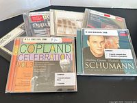 Front view showing six CD jewel cases with library labels